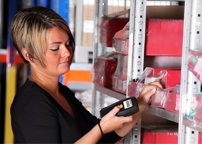 Lady is using Barcode Scanners